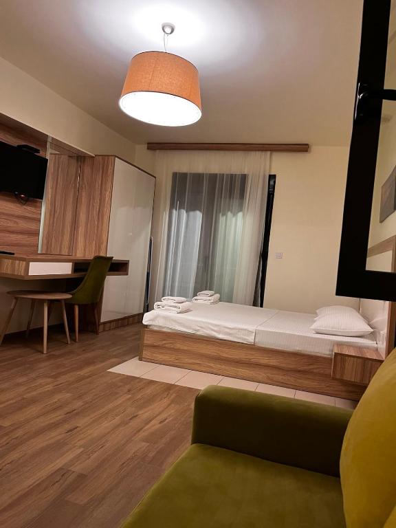 Postel nebo postele na pokoji v ubytování Apartments E&S