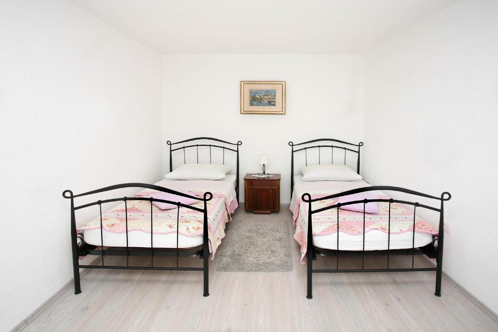 Postel nebo postele na pokoji v ubytování Holiday Home Miklica