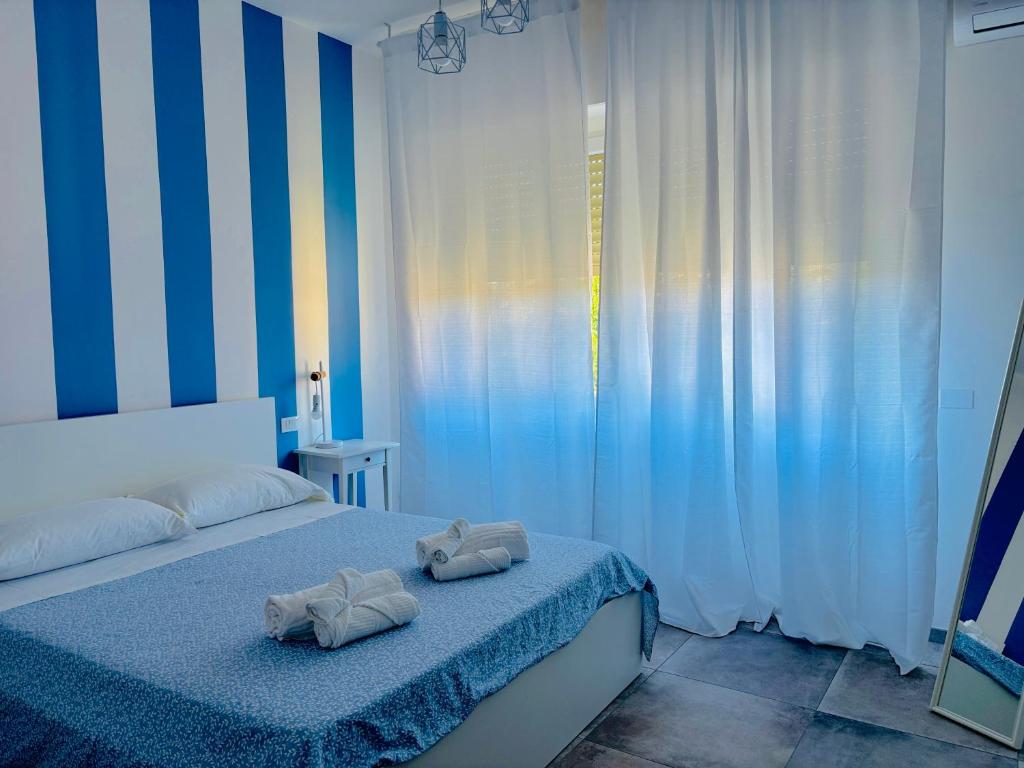 Postel nebo postele na pokoji v ubytování Serendipity
