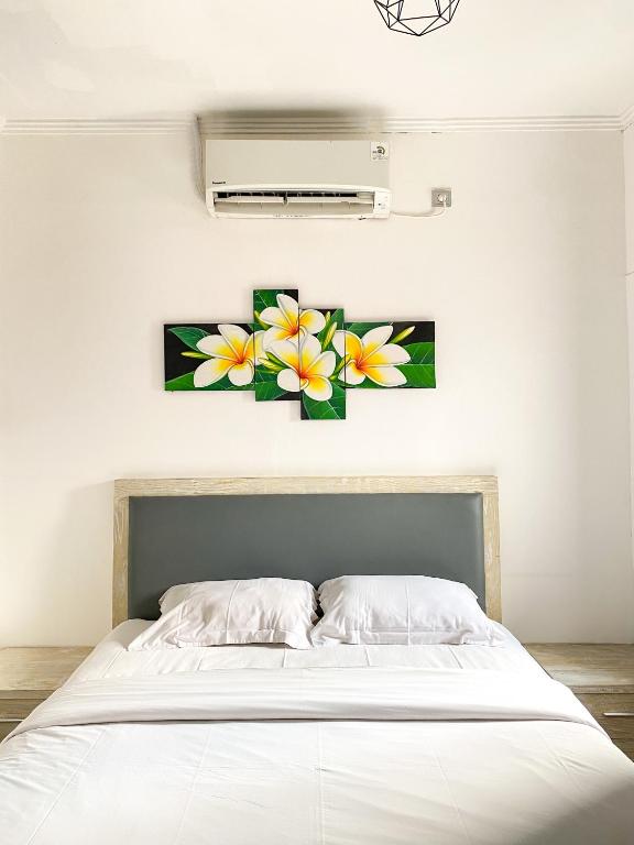 Postel nebo postele na pokoji v ubytování ALA Hostel