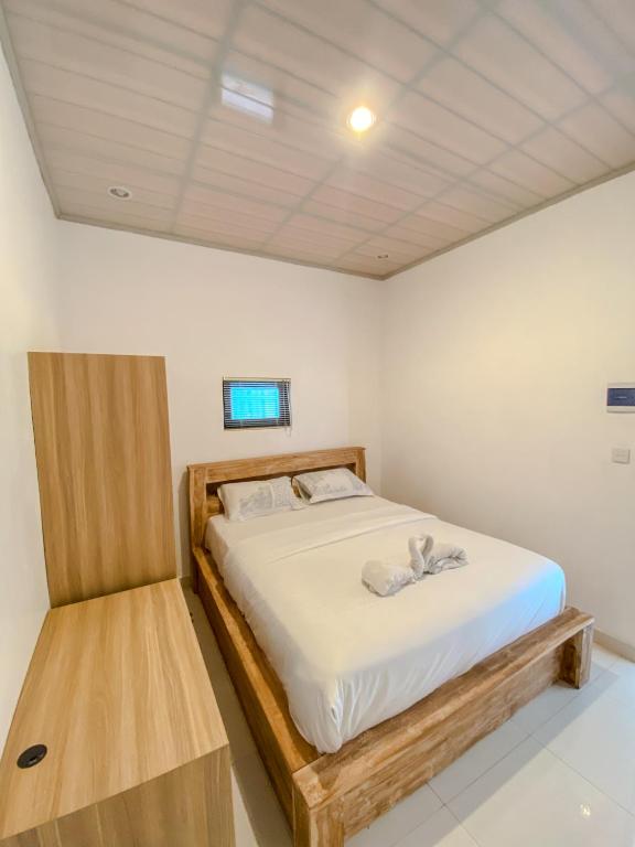 Postel nebo postele na pokoji v ubytování ALA Hostel