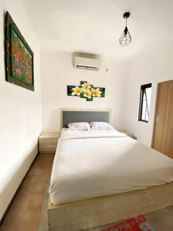 Postel nebo postele na pokoji v ubytování ALA Hostel