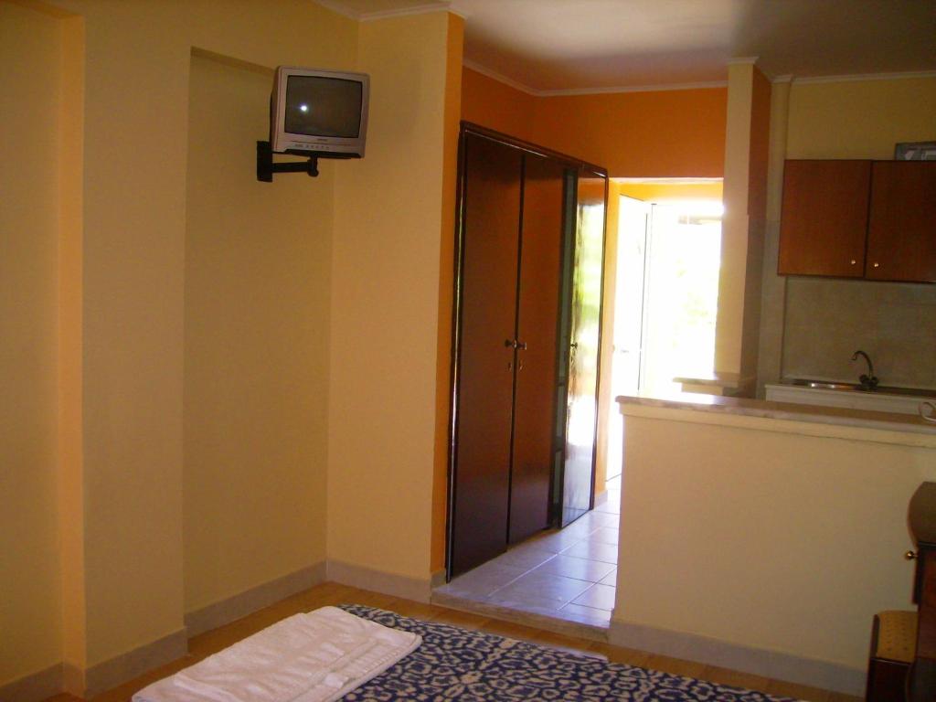 Postel nebo postele na pokoji v ubytování Aggelos Family Hotel