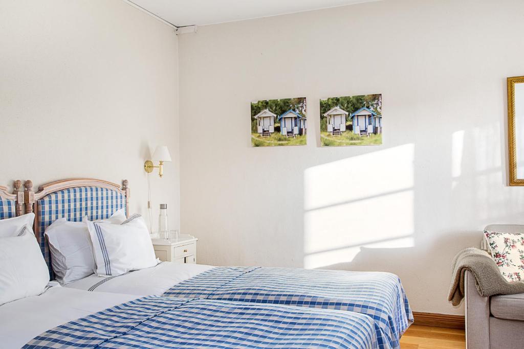 Postel nebo postele na pokoji v ubytování Hotell Gässlingen