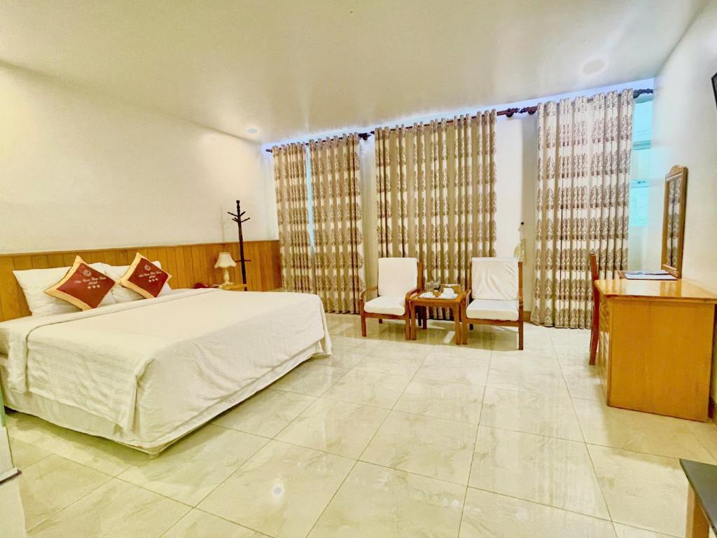 Postel nebo postele na pokoji v ubytování SÀI GÒN - BẠC LIÊU Hotel