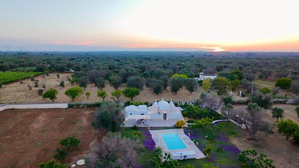 Photo de la galerie de l'établissement Trullo Lis con Piscina Privata, à San Michele Salentino