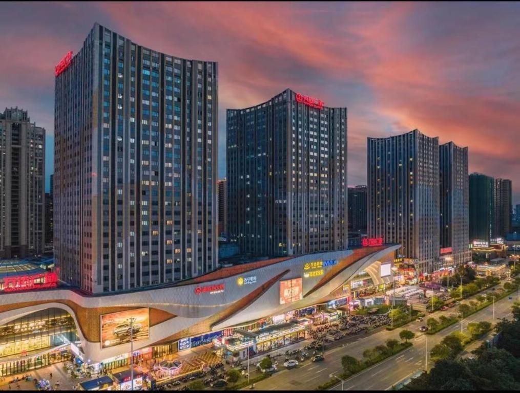 a city with tall skyscrapers in a city at Borrman Hotel Nanning Anji Wanda Plaza Sulu Metro Station in Nanning