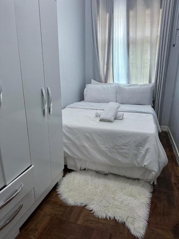 Postel nebo postele na pokoji v ubytování Tsitsi Sea Side