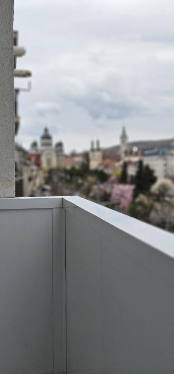 a view of a city from a balcony at Central 21 in Târgu-Mureş