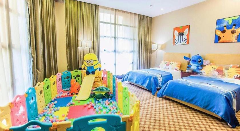 Postel nebo postele na pokoji v ubytování Nanning Yongjiang Hotel