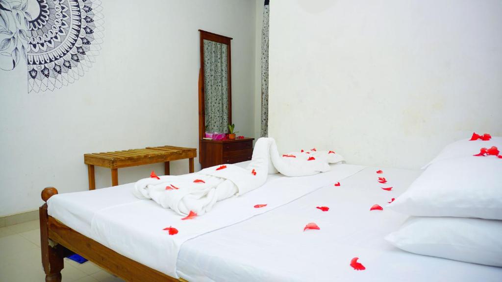 Postel nebo postele na pokoji v ubytování Cozy Secrets Hotel & Hostel