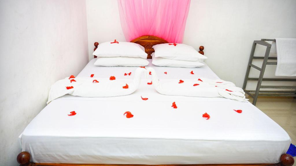 Postel nebo postele na pokoji v ubytování Cozy Secrets Hotel & Hostel