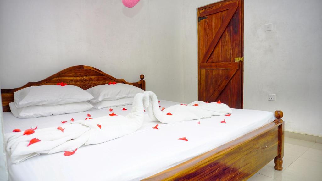 Postel nebo postele na pokoji v ubytování Cozy Secrets Hotel & Hostel