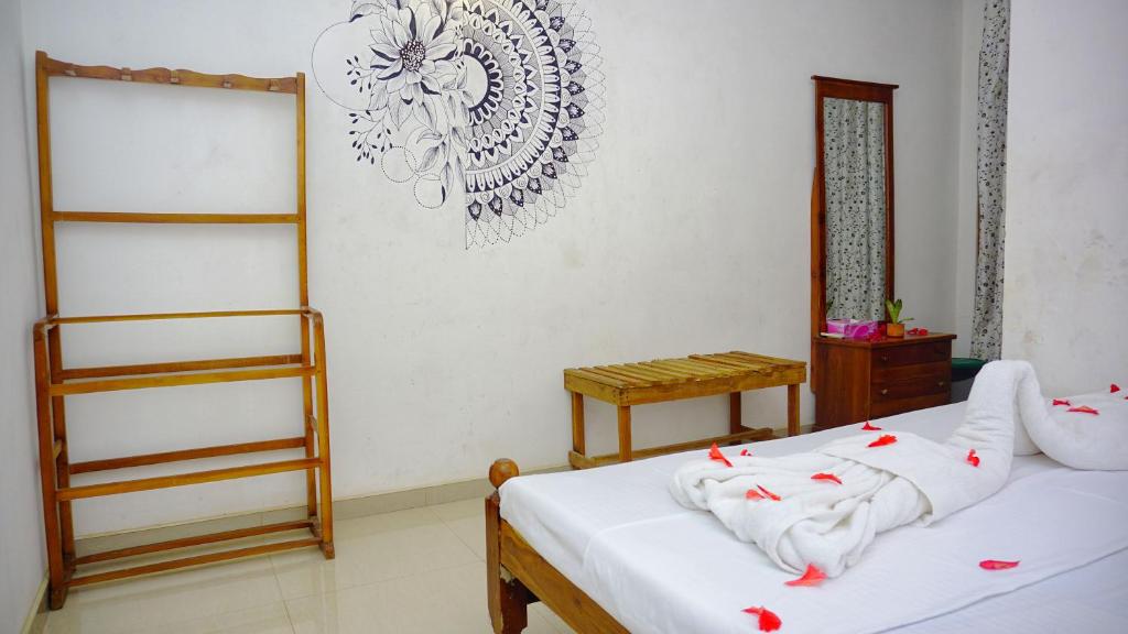 Postel nebo postele na pokoji v ubytování Cozy Secrets Hotel & Hostel