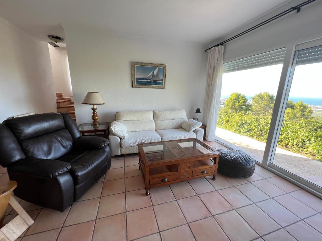 Posezení v ubytování Chalet cerca de Denia, piscina, playa y Montaña,