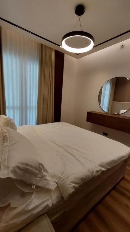 Postel nebo postele na pokoji v ubytování Luxury 1BHK with Balcony - Muscat Hills