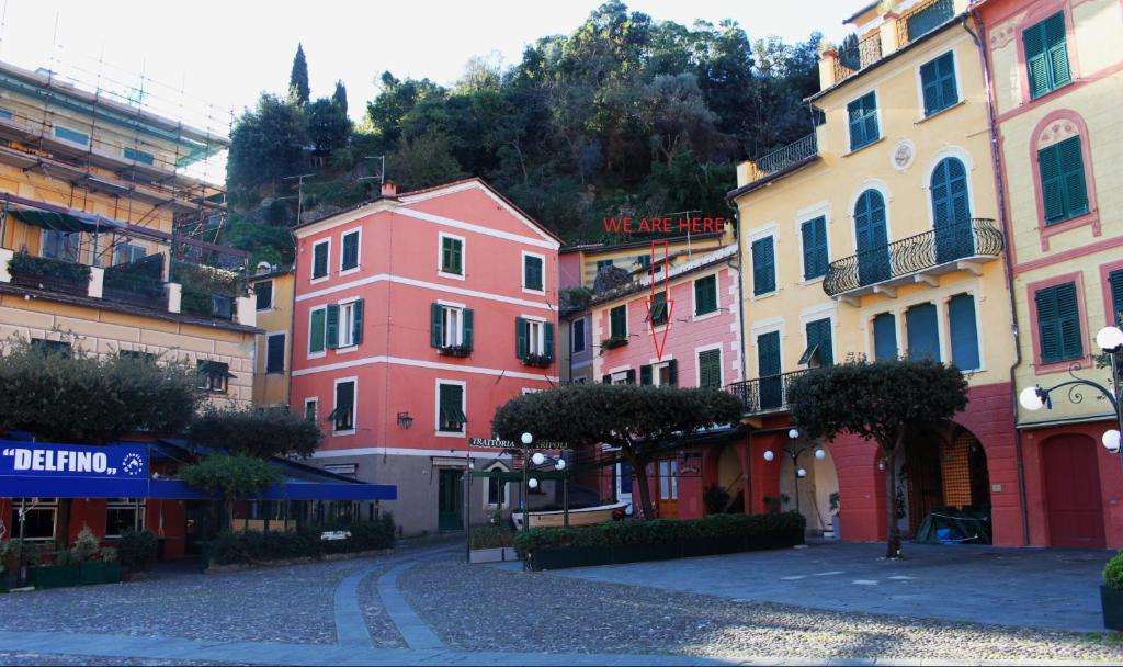 a group of colorful buildings on a street at Clara's House in Portofino