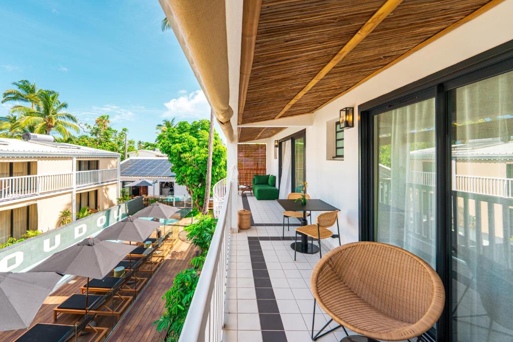Balkón nebo terasa v ubytování Doudou Hôtel