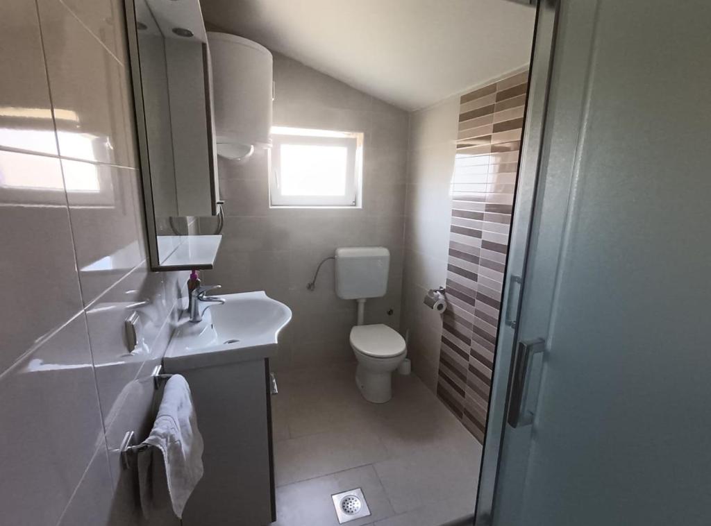 Kúpeľňa v ubytovaní Apartment Kurelić