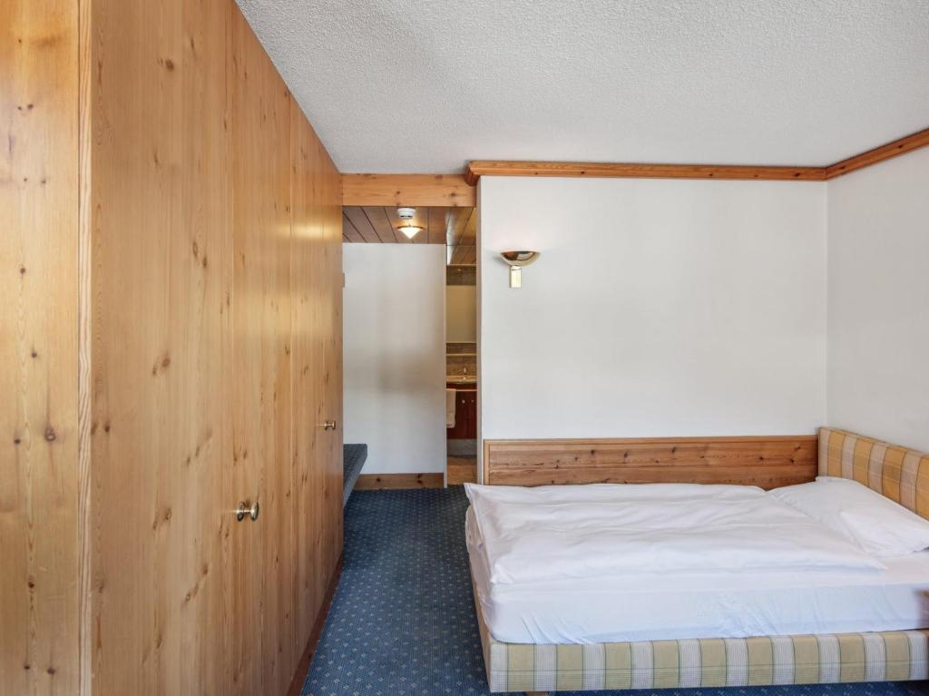 Postel nebo postele na pokoji v ubytování The Grand Arosa - Pop-Up Hotel