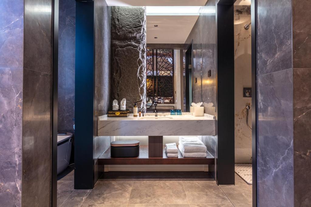 Koupelna v ubytování Tao Hotel