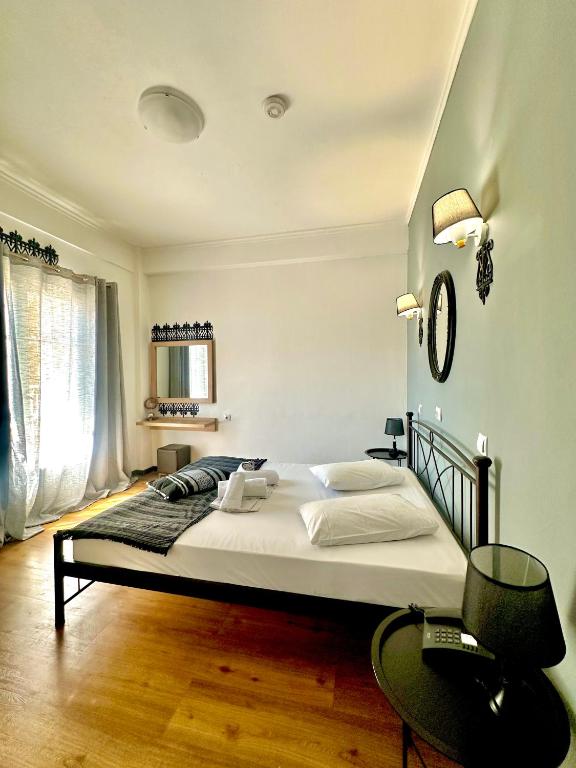 Ένα ή περισσότερα κρεβάτια σε δωμάτιο στο Sparta Team Hotel