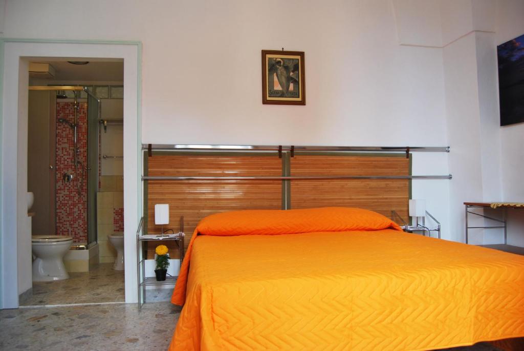 Postel nebo postele na pokoji v ubytování DF bed and breakfast