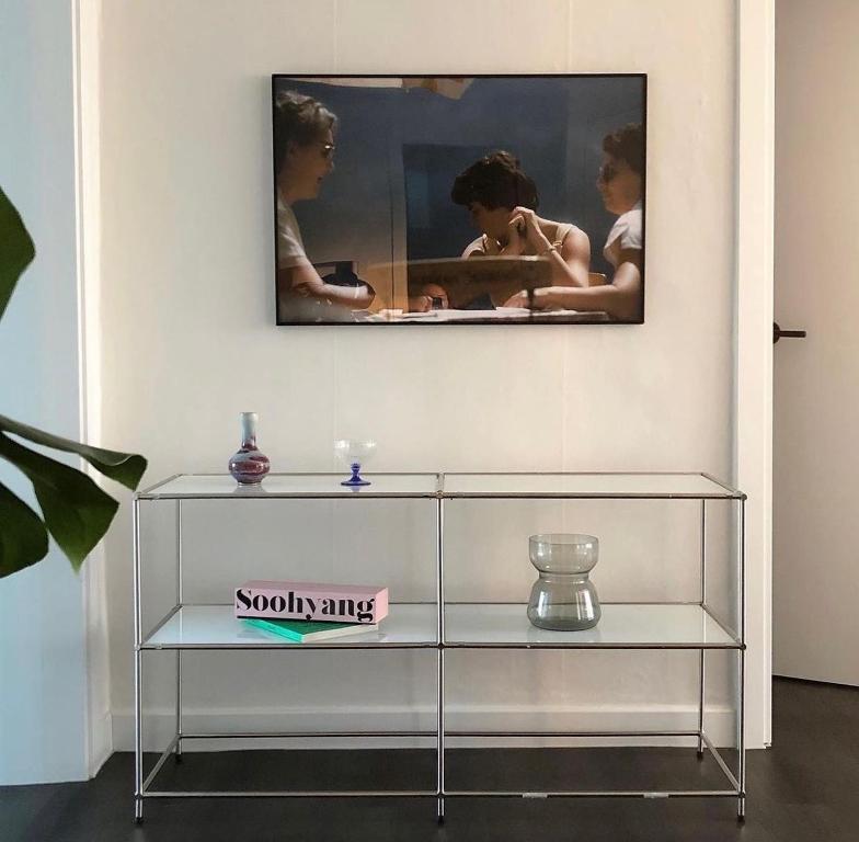 TV a/nebo společenská místnost v ubytování 플로우연남