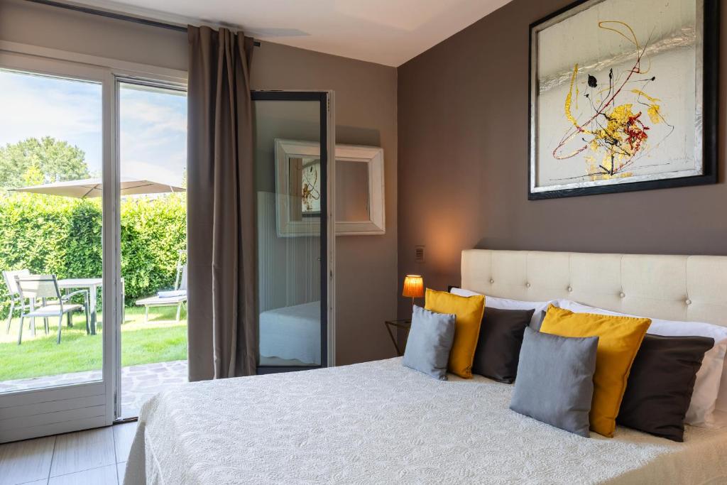 Postel nebo postele na pokoji v ubytování Agriturismo Moscatello