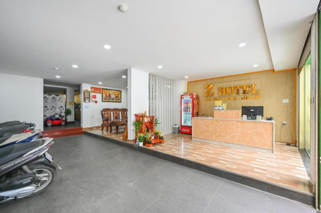 a store with a motorcycle parked in a room at Z Hotel Sai Gon in Ho Chi Minh City