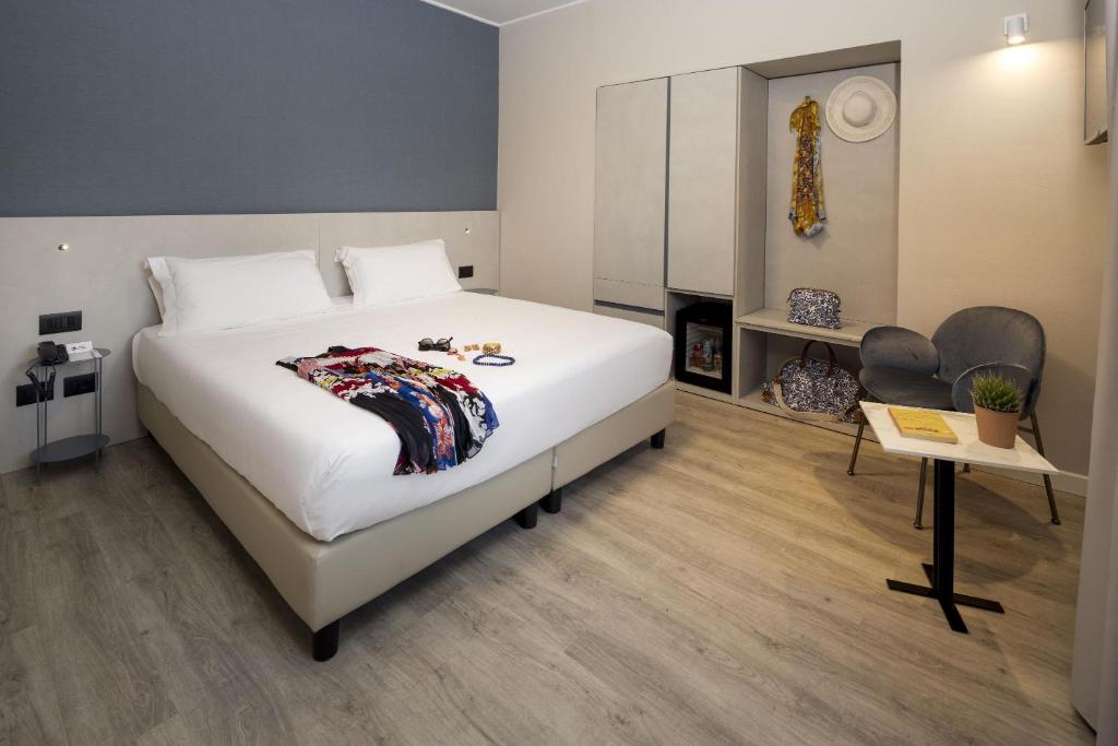 Postel nebo postele na pokoji v ubytování Best Western Regina Elena
