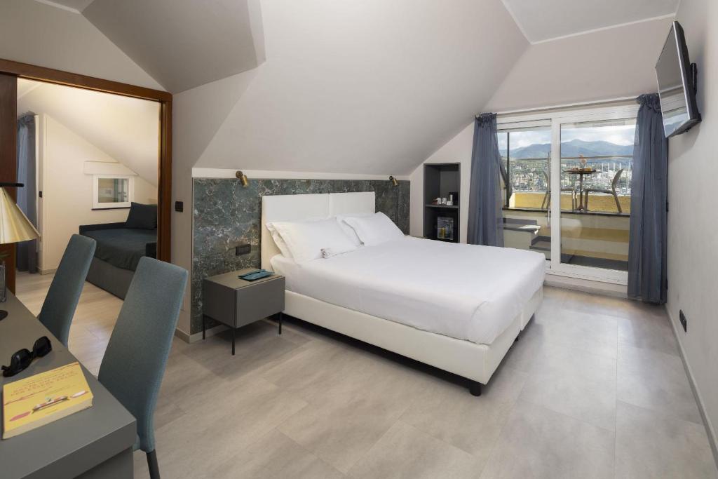 Postel nebo postele na pokoji v ubytování Best Western Regina Elena