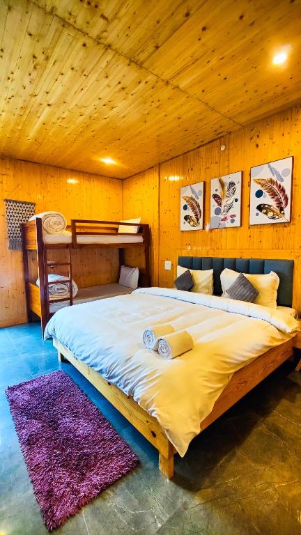 Postel nebo postele na pokoji v ubytování Ila by Aaryam, Kanatal