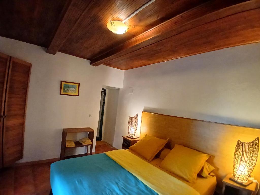 Postel nebo postele na pokoji v ubytování LÉ FÈ COCO