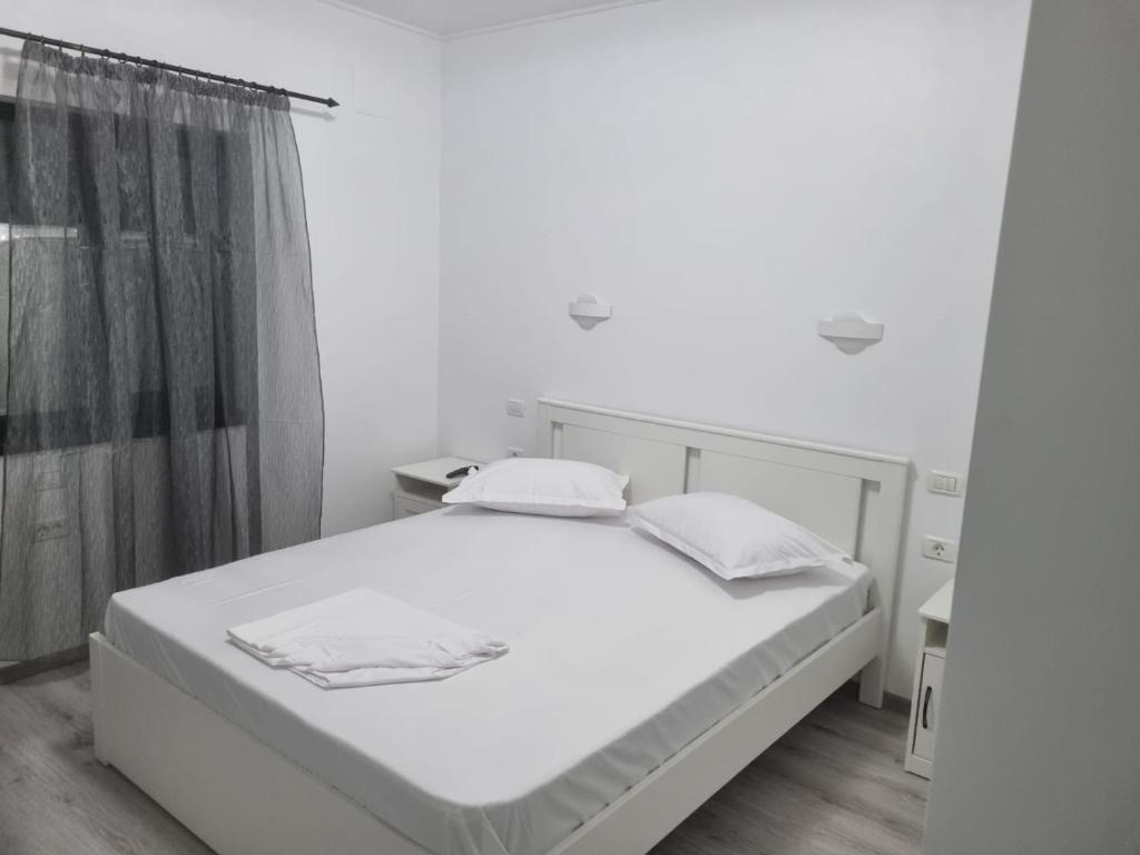 Postel nebo postele na pokoji v ubytování Casa Mihai