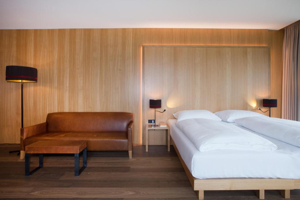 Postel nebo postele na pokoji v ubytování Hotel Schwärzler