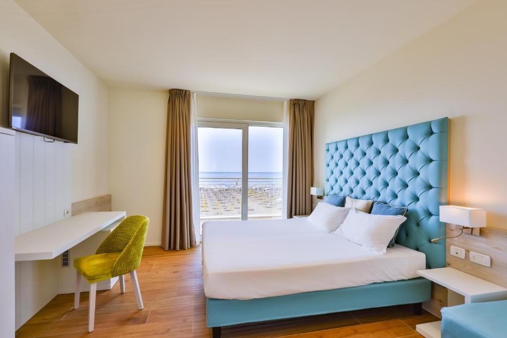 Postel nebo postele na pokoji v ubytování Hotel Ariston