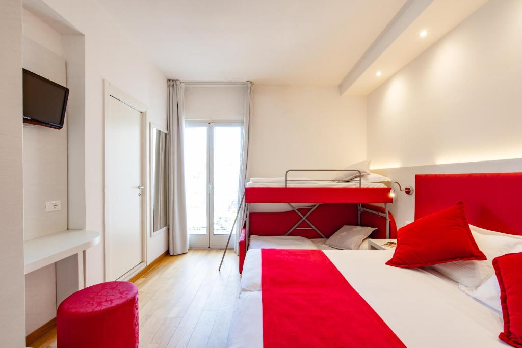Postel nebo postele na pokoji v ubytování Hotel Ariston