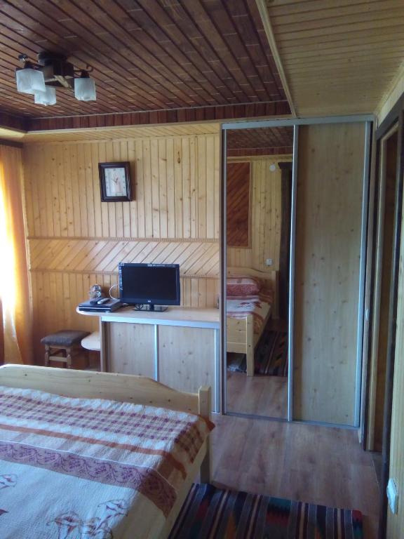 Postel nebo postele na pokoji v ubytování Homestay Opryshky