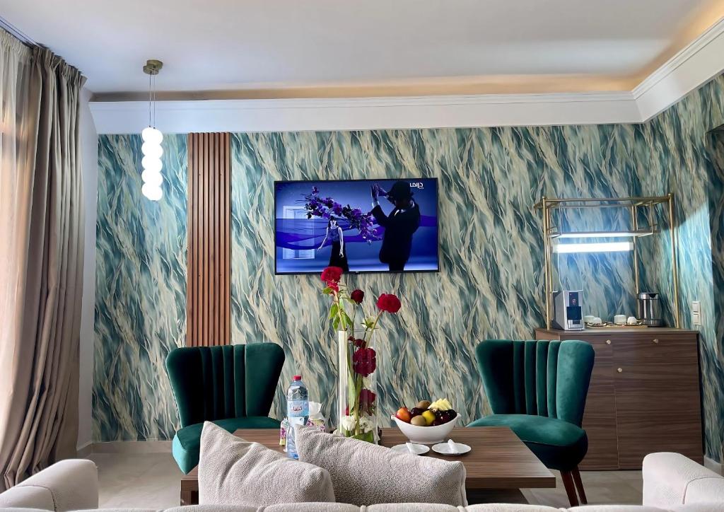 TV a/nebo společenská místnost v ubytování Hotel Prestige Agadir Boutique & SPA
