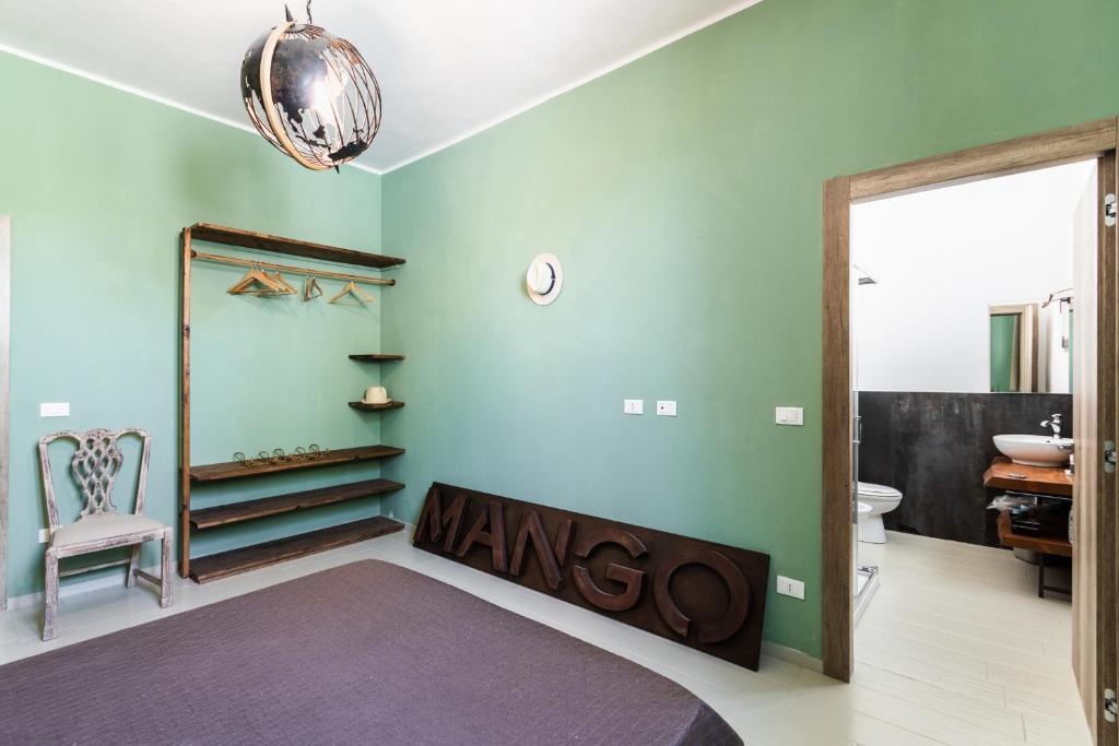 Postel nebo postele na pokoji v ubytování Agriturismo Val Di Noto