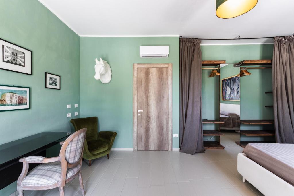 Postel nebo postele na pokoji v ubytování Agriturismo Val Di Noto