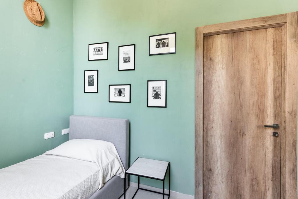 Postel nebo postele na pokoji v ubytování Agriturismo Val Di Noto
