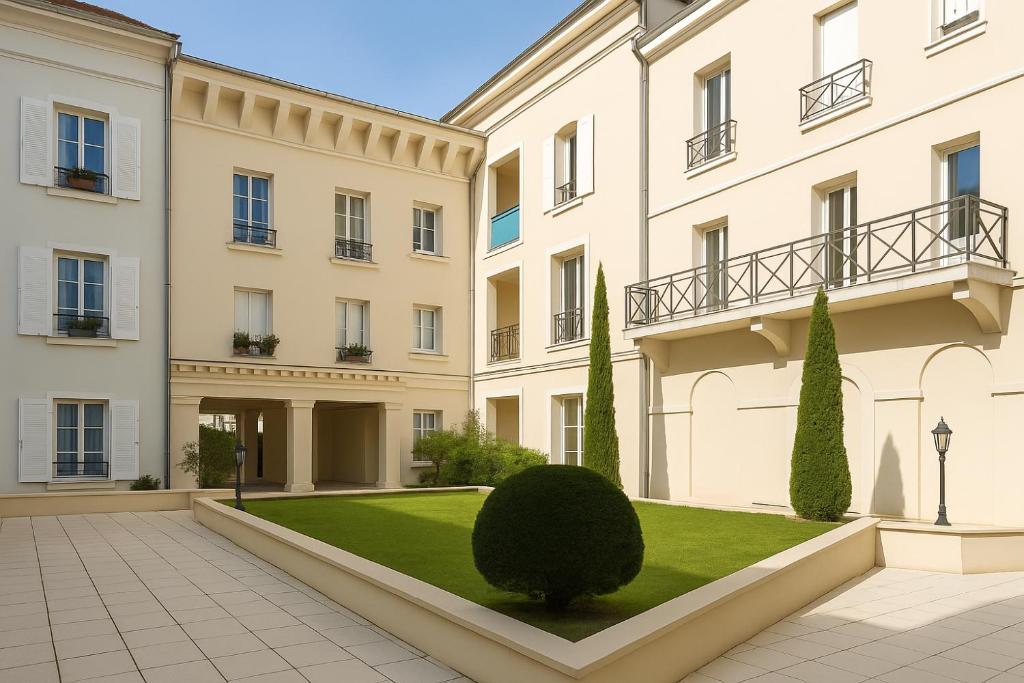 an exterior view of a building with a lawn at Place Toscane, 8P, Fibre et Parking à Disneyland in Serris