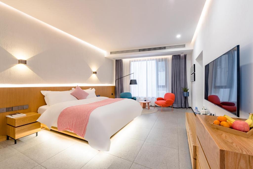 Een TV en/of entertainmentcenter bij Zhangjiajie Tianmen Mountain Cableway High-end B&B
