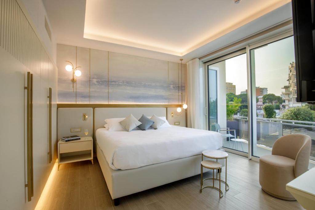 Ambasciatori Suite Hotel客房内的一张或多张床位