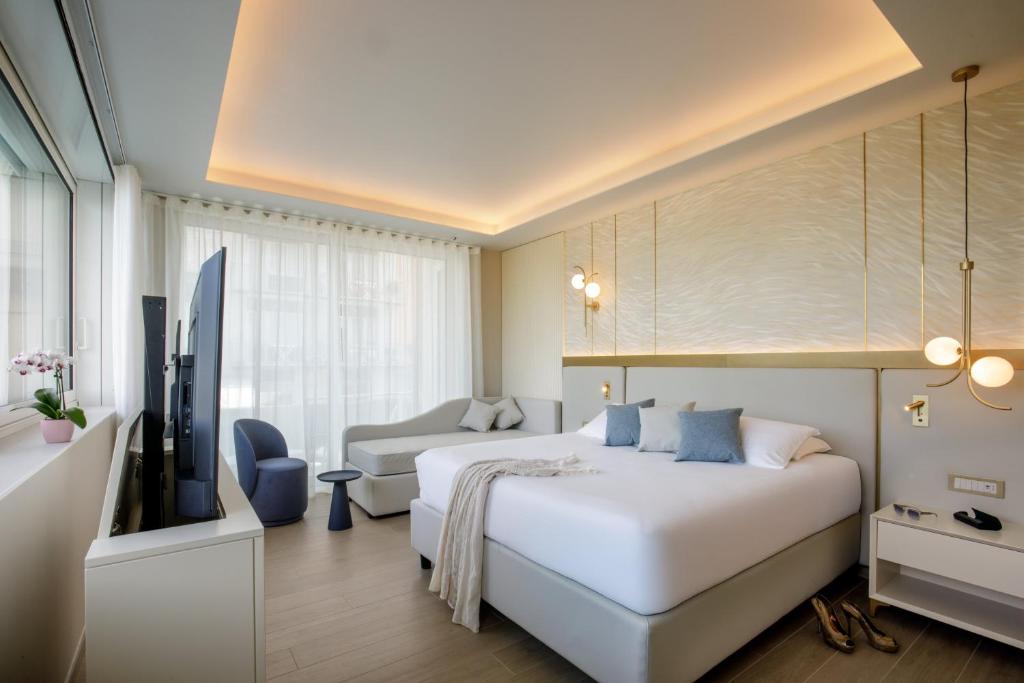 Ambasciatori Suite Hotel客房内的一张或多张床位
