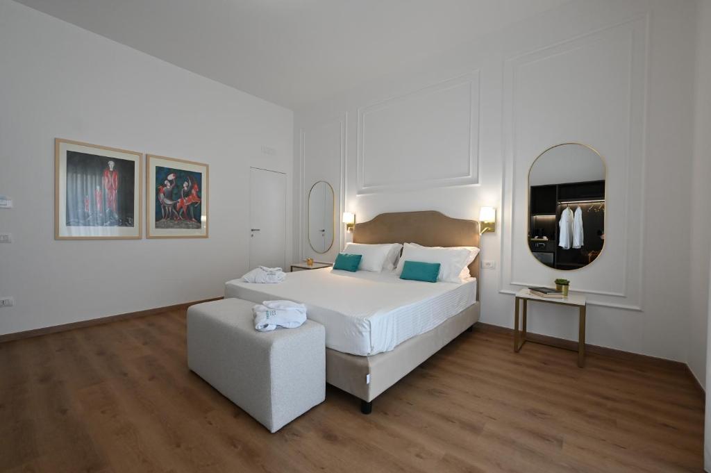 Postel nebo postele na pokoji v ubytování Spazio83 Comfort Rooms