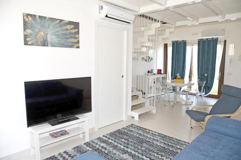 TV a/nebo společenská místnost v ubytování Agriturismo La Pecora Nera
