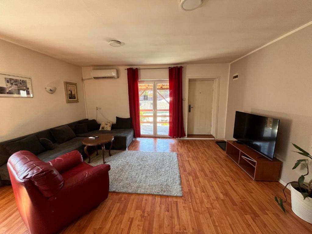 TV a/nebo společenská místnost v ubytování Apart Zen House